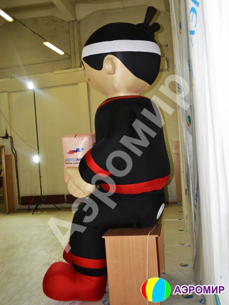 Надувные фигуры на крышу — сидячие фигуры для рекламы на крушу или подиум