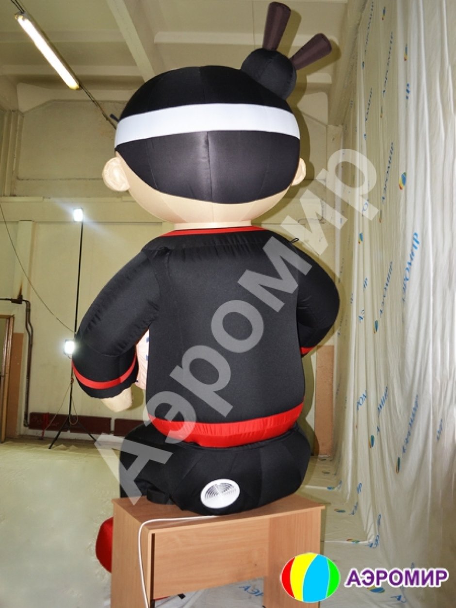 Надувные фигуры на крышу — сидячие фигуры для рекламы на крушу или подиум